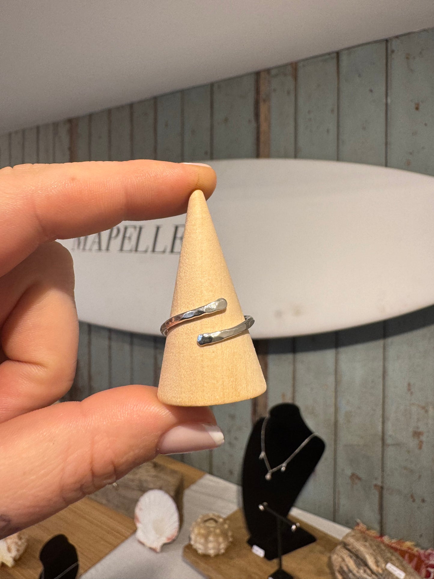 Line textured hug ring