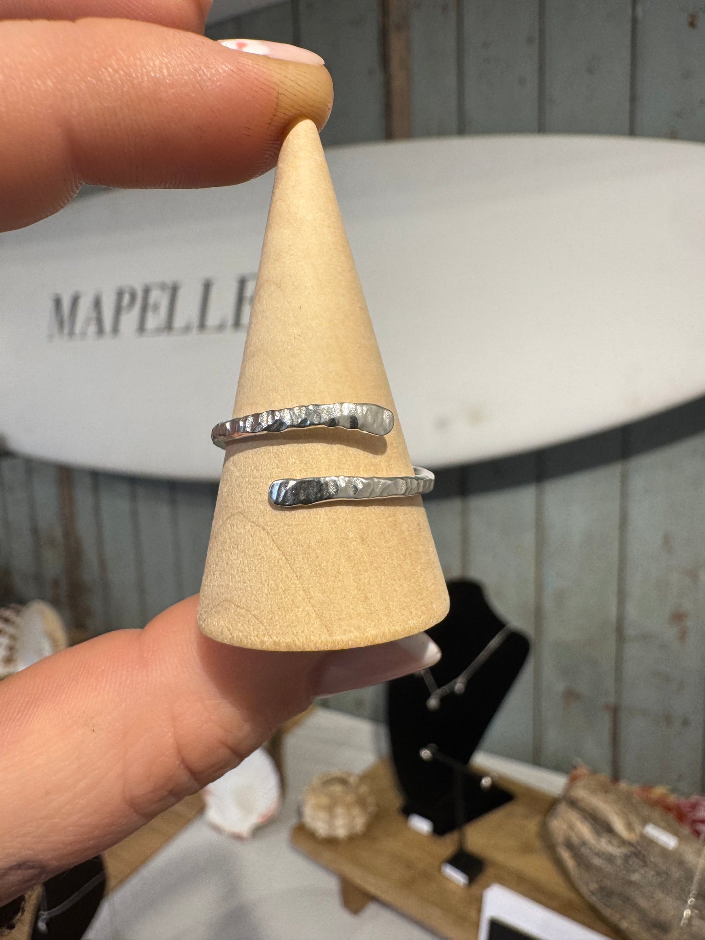 Line textured hug ring